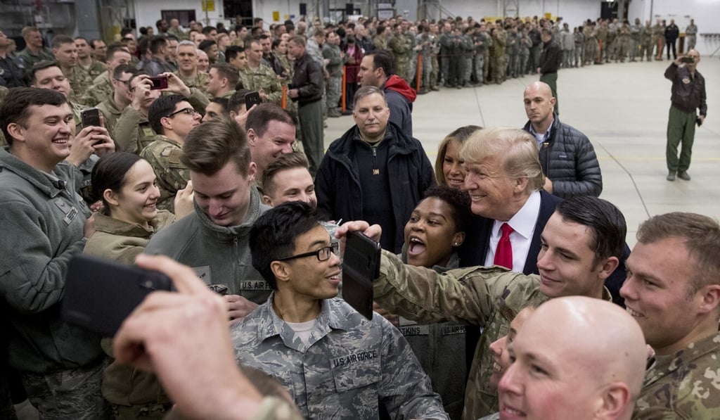 President Donald Trump meeting members of the US military at Ramstein Air Base, Germany, in 2018. Photo: AP
