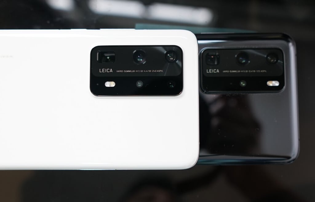 The camera module of the Huawei P40 Pro Plus (left) is larger than that of the P40 Pro, and houses an additional telephoto zoom lens and a more advanced Periscope zoom lens. Photo: Ben Sin