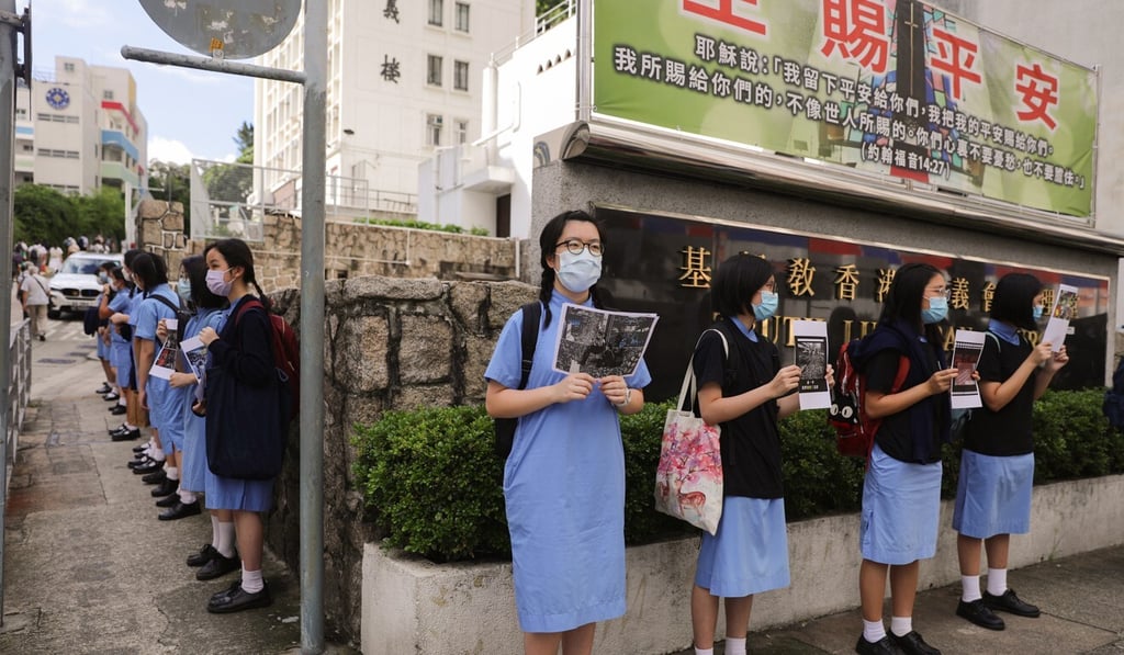 ELCHK Lutheran Secondary School and True Light Girls College pupils form a human chain in protest against the national security law. Photo: Sam Tsang