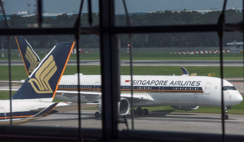 A Singapore Airlines passenger jet seen at Changi International Airport on June 8. Photo: AFP A Singapore Airlines passenger jet seen at Changi International Airport on June 8. Photo: AFP