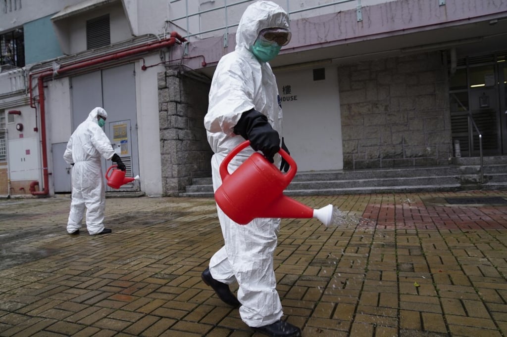 Disinfection works on May 31 at Luk Chuen House in Lek Yuen Estate, Sha Tin, where nine cases have been confirmed. Photo: Sam Tsang Disinfection works on May 31 at Luk Chuen House in Lek Yuen Estate, Sha Tin, where nine cases have been confirmed. Photo: Sam Tsang