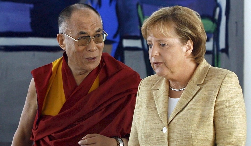 Angela Merkel upset Beijing when she met the Dalai Lama in 2007. Photo: EPA Angela Merkel upset Beijing when she met the Dalai Lama in 2007. Photo: EPA
