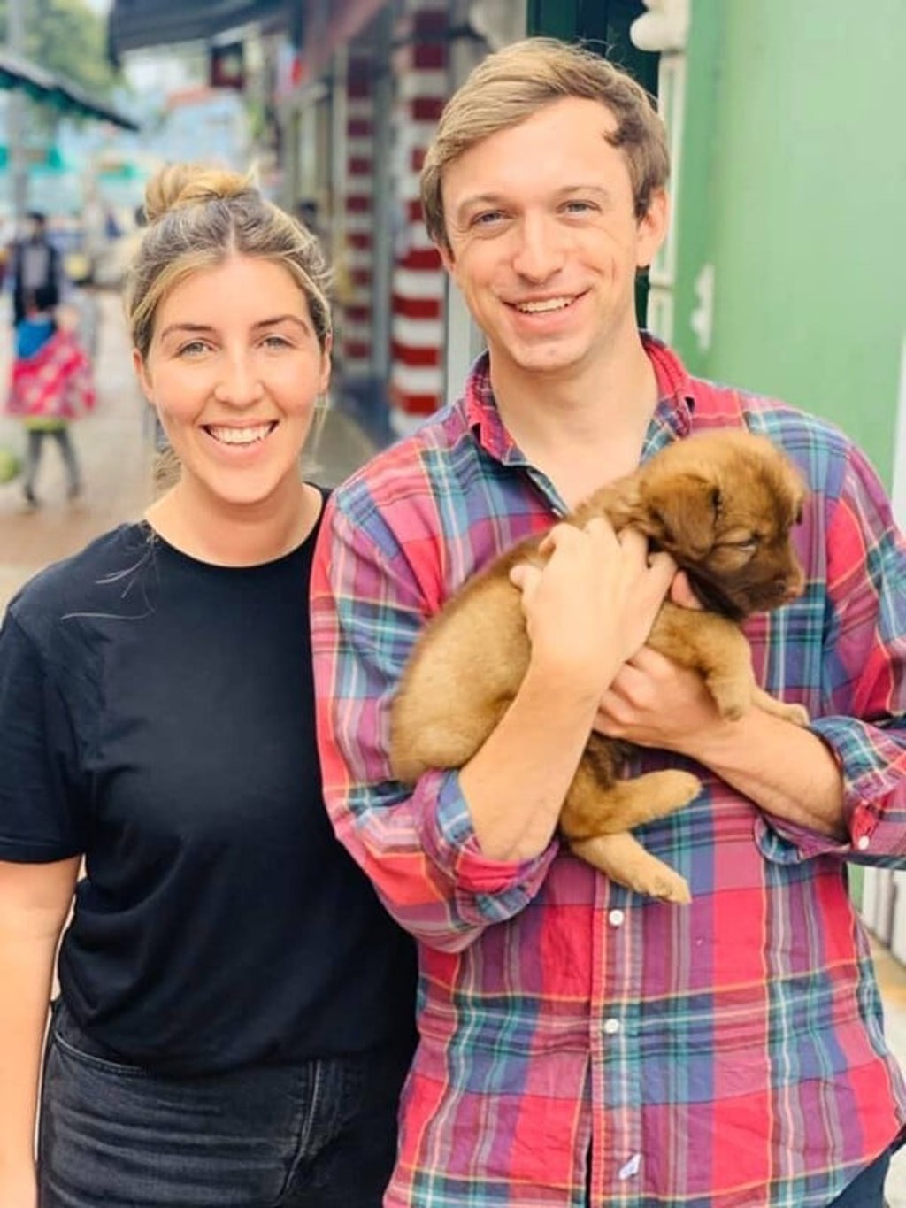 Jordanne Grey and her partner Greg Rawson with Loki as a puppy. Photo: Handout Jordanne Grey and her partner Greg Rawson with Loki as a puppy. Photo: Handout