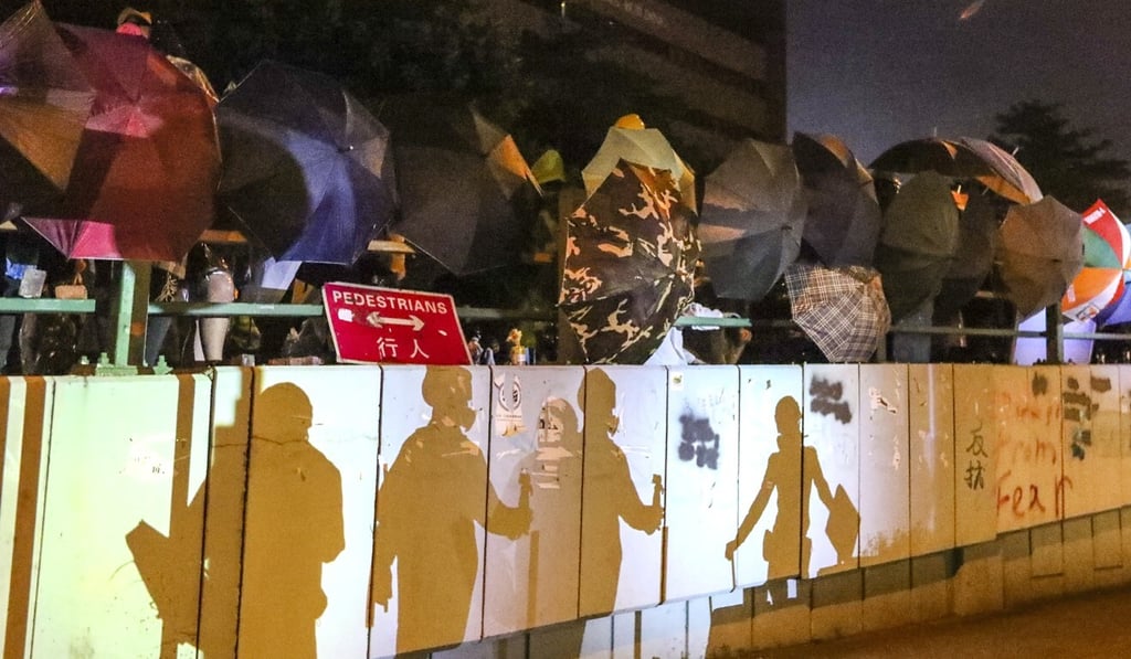 Protesters face off with police outside Polytechnic University in Hung Hom last November. Photo: Felix Wong Protesters face off with police outside Polytechnic University in Hung Hom last November. Photo: Felix Wong