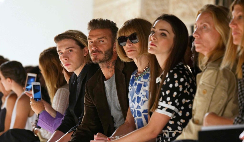 Rocking with the best: Anna Wintour sits next to David Beckham at the Victoria Beckham Spring Summer 2017 show at New York Fashion Week. Photo: AFP