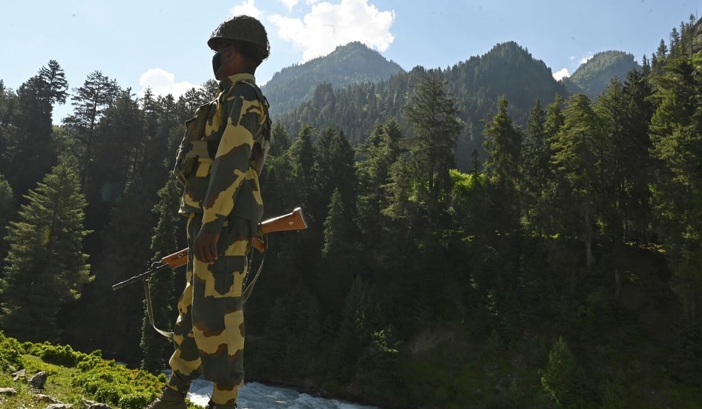 An Indian Border Security Force soldier guards a highway leading towards Leh, bordering China, in Gagangir on Wednesday. Photo: AFP An Indian Border Security Force soldier guards a highway leading towards Leh, bordering China, in Gagangir on Wednesday. Photo: AFP