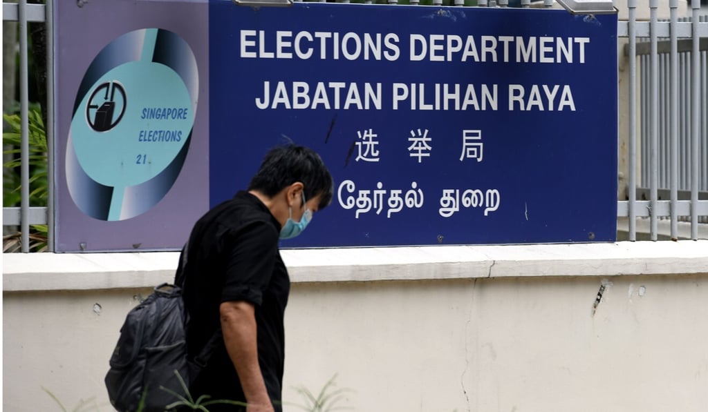 A man walks past the Elections Department centre in Singapore. Photo: AFP