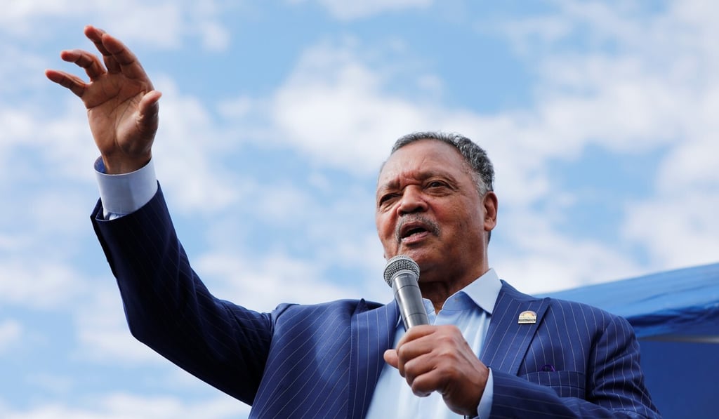 Reverend Jesse Jackson speaks to protesters. Photo: Reuters