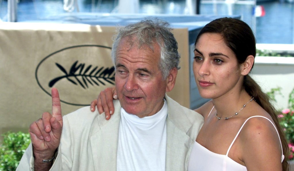 Actor Ian Holm (C) with American actress Summer Phoenix at the Cannes Film Festival in 2000. Photo: Reuters