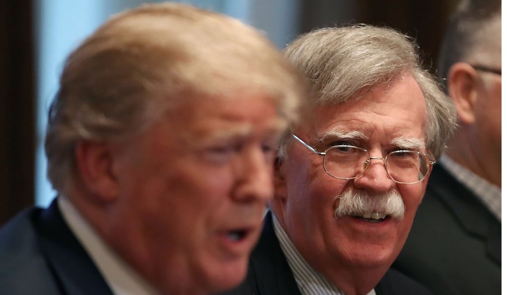 US President Donald Trump with his then-national security adviser John Bolton in April 2018. Photo: AFP