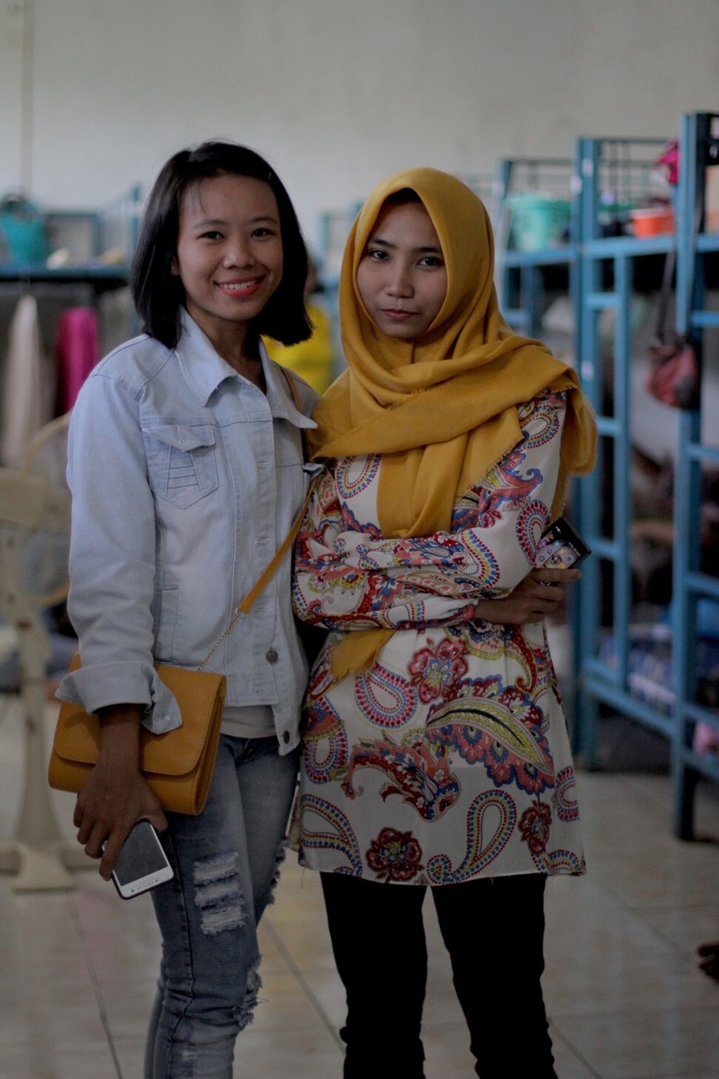Sukma (left) with fellow trainee Ani Sumeri at a boarding house in Indramayu, Indonesia.