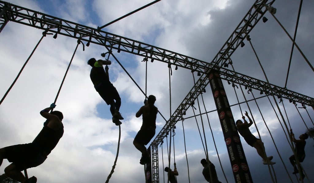 Competitors battle the ropes at the 2018 Spartan Race. Photo: Jonathan Wong