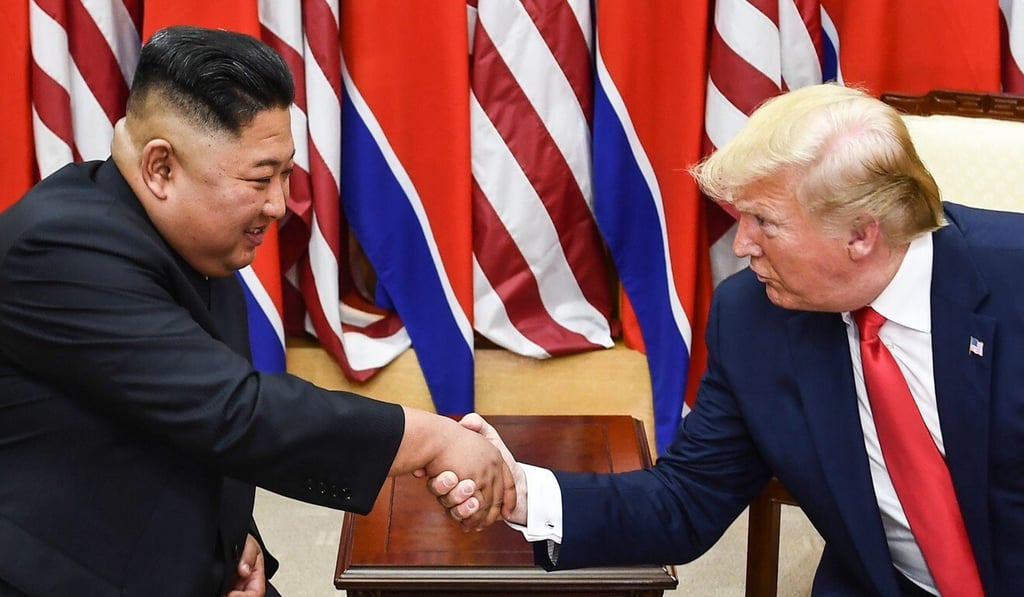 Kim Jong-un and US President Donald Trump shake hands during a meeting on the south side of the Military Demarcation Line in March 2020. Photo: Brendan Smialowski/AFP Kim Jong-un and US President Donald Trump shake hands during a meeting on the south side of the Military Demarcation Line in March 2020. Photo: Brendan Smialowski/AFP