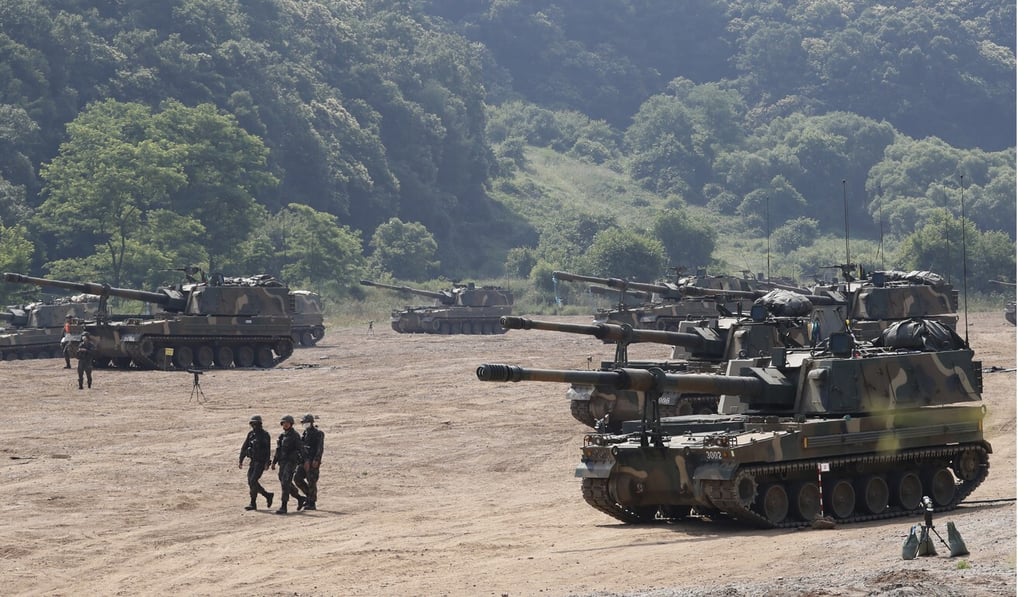 South Korean army K-9 self-propelled howitzers take positions during an annual exercise in Paju, near the border with North Korea, on June 23. Photo: AP South Korean army K-9 self-propelled howitzers take positions during an annual exercise in Paju, near the border with North Korea, on June 23. Photo: AP