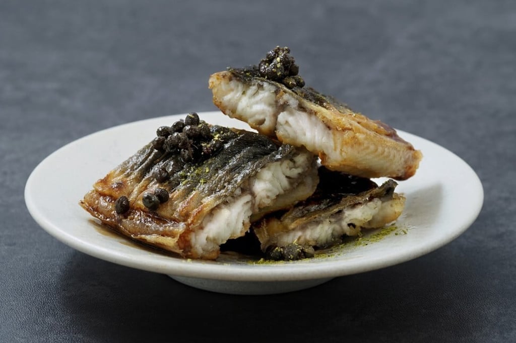 Grilled crispy eel with Kyoto sanshonomi sauce at Nikushou is a signature dish. Photo: Nikushou Grilled crispy eel with Kyoto sanshonomi sauce at Nikushou is a signature dish. Photo: Nikushou
