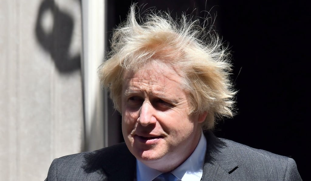 British Prime Minister Boris Johnson said England’s hairdressers could reopen early next month. Photo: AFP