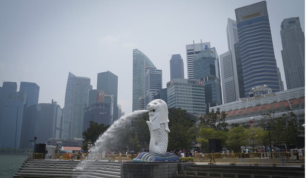 Singapore’s Merlion statue with the background of business district. Photo: AP Singapore’s Merlion statue with the background of business district. Photo: AP