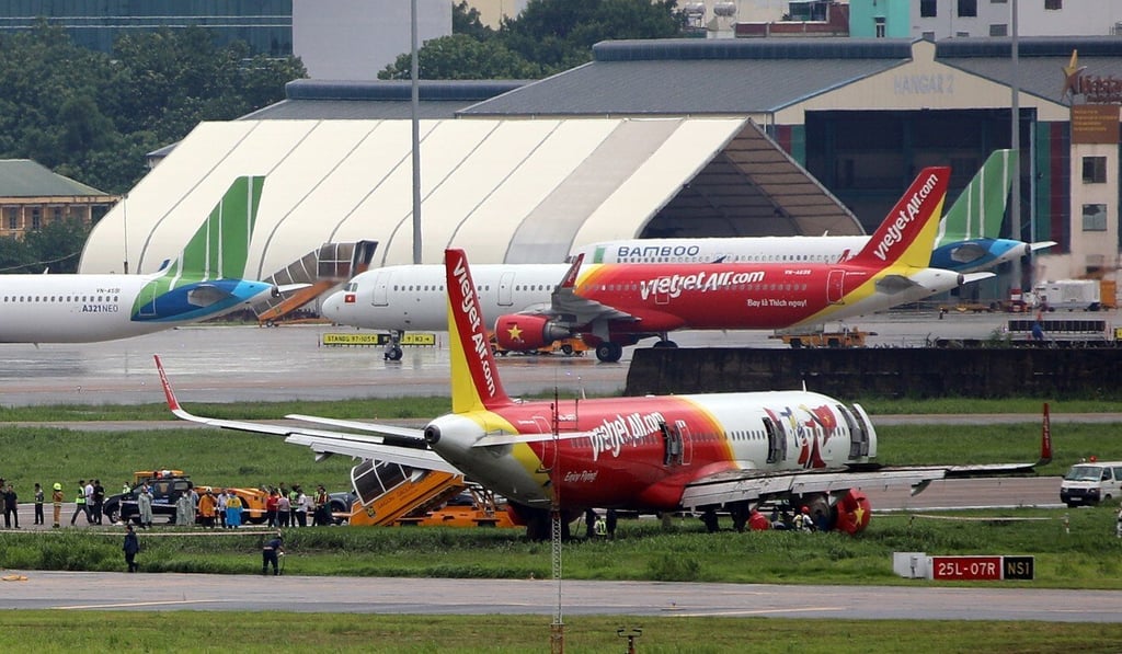 Aircraft belonging to Vietnamese carrier VietJet Air are seen at Tan Son Nhat International Airport in Ho Chi Minh City. Photo: EPA