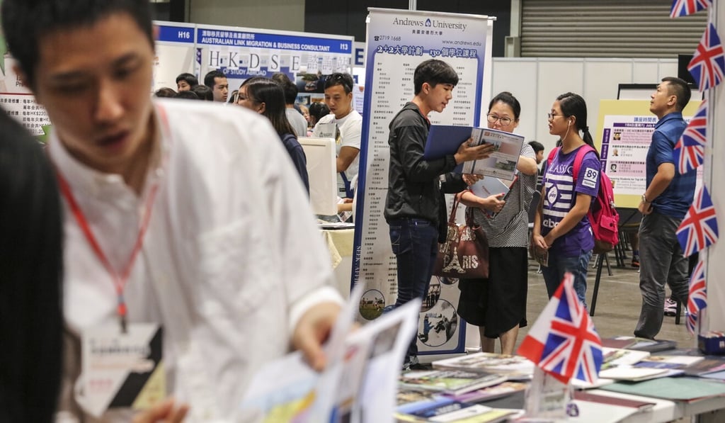 Parents meet with consultants at the Hong Kong International Education Expo in July 2017. Photo: Felix Wong