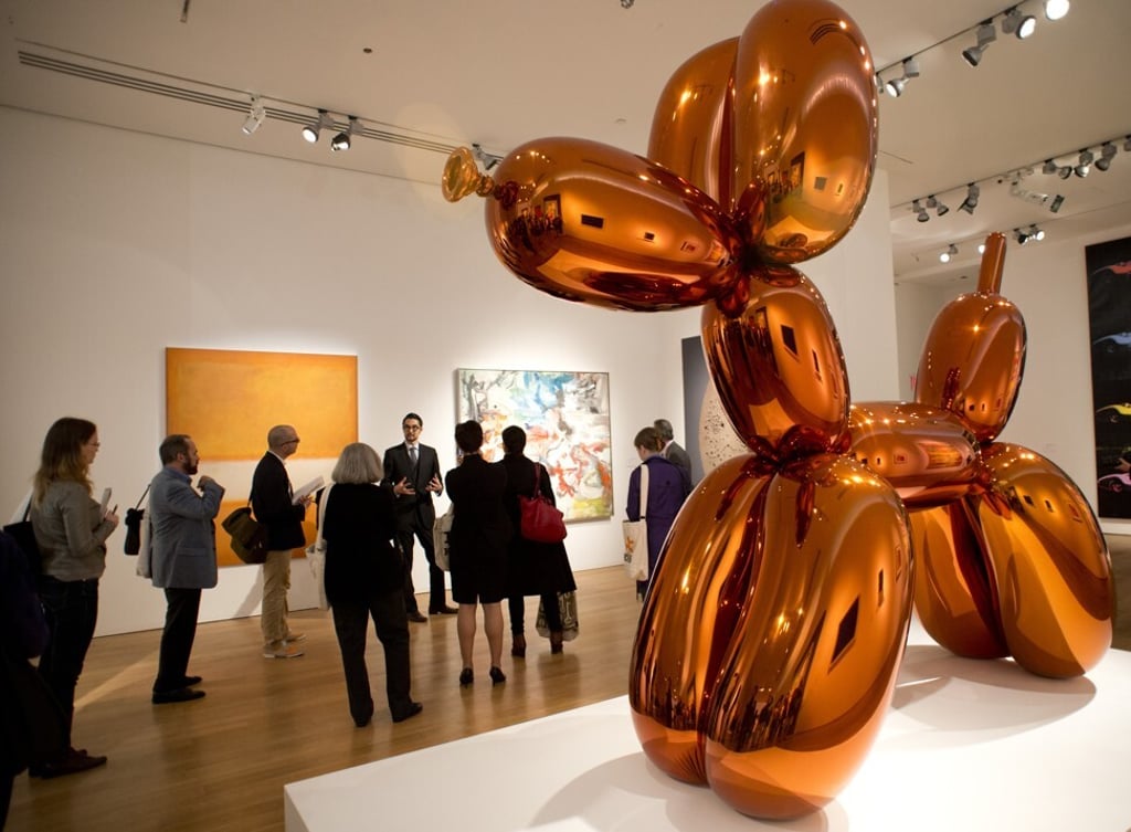 Sold for US$58.4 million, Jeff Koons' Balloon Dog (Orange) became the world’s most expensive art work by a living artist sold at auction. Photo: AFP