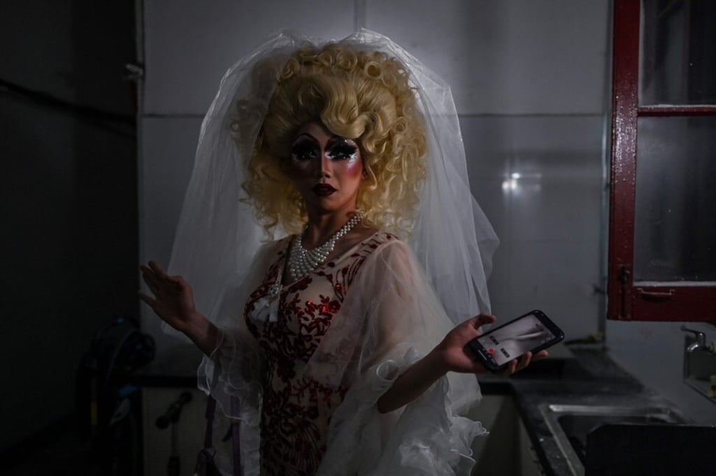 Miss Cream gets ready before her first presentation as a drag queen in a bar of the city of Shanghai. Photo: AFP Miss Cream gets ready before her first presentation as a drag queen in a bar of the city of Shanghai. Photo: AFP