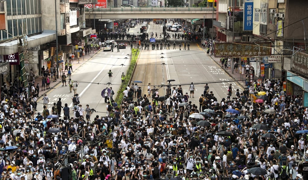 Protesters against the new national security law march in Hong Kong’s Causeway Bay on Wednesday. Photo: Sam Tsang Protesters against the new national security law march in Hong Kong’s Causeway Bay on Wednesday. Photo: Sam Tsang