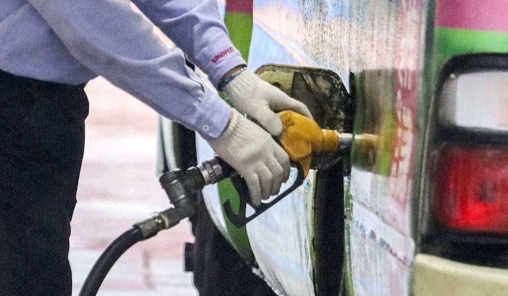 A litre of petrol costs much more in Hong Kong than in London, New York or Sydney. Photo: Felix Wong A litre of petrol costs much more in Hong Kong than in London, New York or Sydney. Photo: Felix Wong