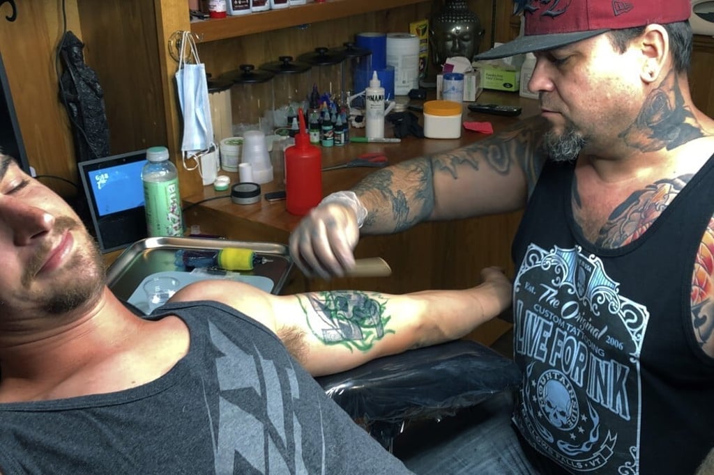 Graves said his swastika tattoo hasn’t drawn a lot of attention because it’s hidden, but he was still eager to get rid of it. Photo: AP Graves said his swastika tattoo hasn’t drawn a lot of attention because it’s hidden, but he was still eager to get rid of it. Photo: AP