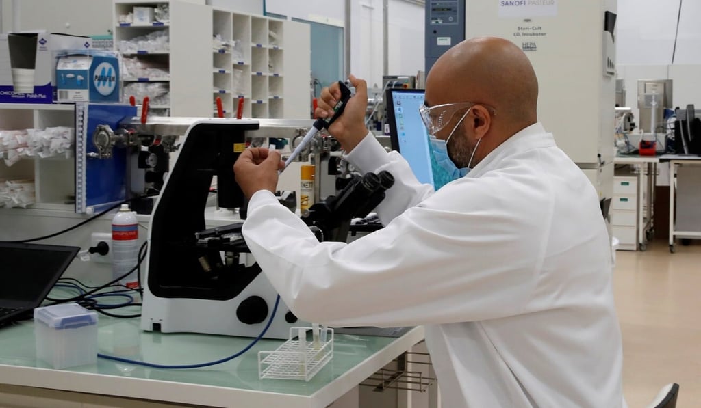 A researcher works in a laboratory at the Sanofi Pasteur plant in Marcy-l'Etoile, near Lyon, in June. Photo: Reuters