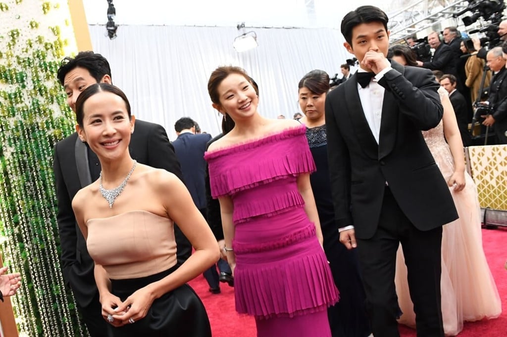South Korean actors Cho Yeo-jeong (left), Park So-dam (centre) and Choi Woo-shik (right) make their mark at the 92nd Oscars ceremony. Photo: AFP