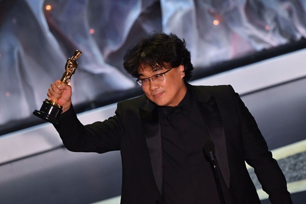 South Korean director Bong Joon-ho accepts Oscar for Best International Feature Film for Parasite. Photo: AFP
