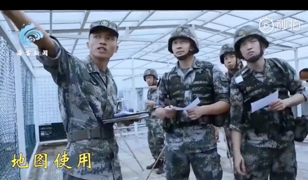 The PLA garrison also practising their map-reading skills. Photo: Weibo