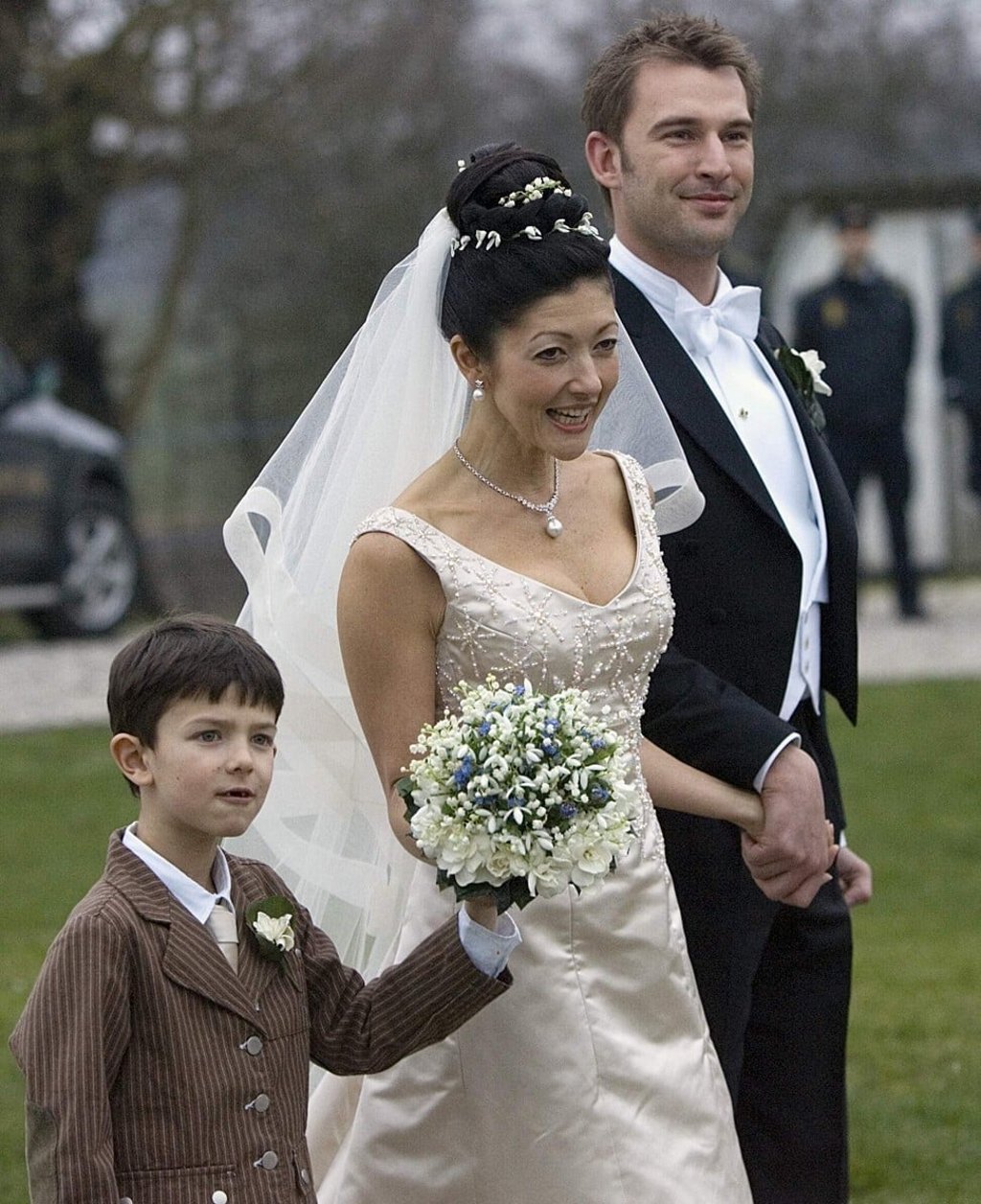 Former Danish Princess Alexandra (centre) with son Prince Nikolai and photographer Martin Jorgensen after their wedding in March 2007. Alexandra divorced Danish Prince Joachim in 2005. Photo: Reuters