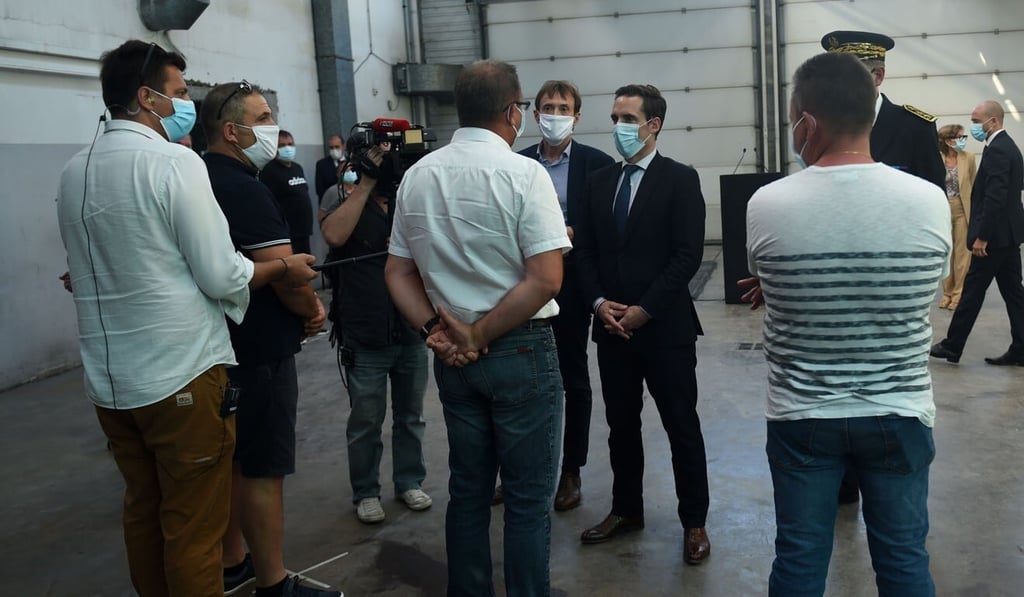 Bus drivers speak with French Junior Transport Minister Jean-Baptise Djebbari on July 7, 2020. Photo: Agence France-Presse