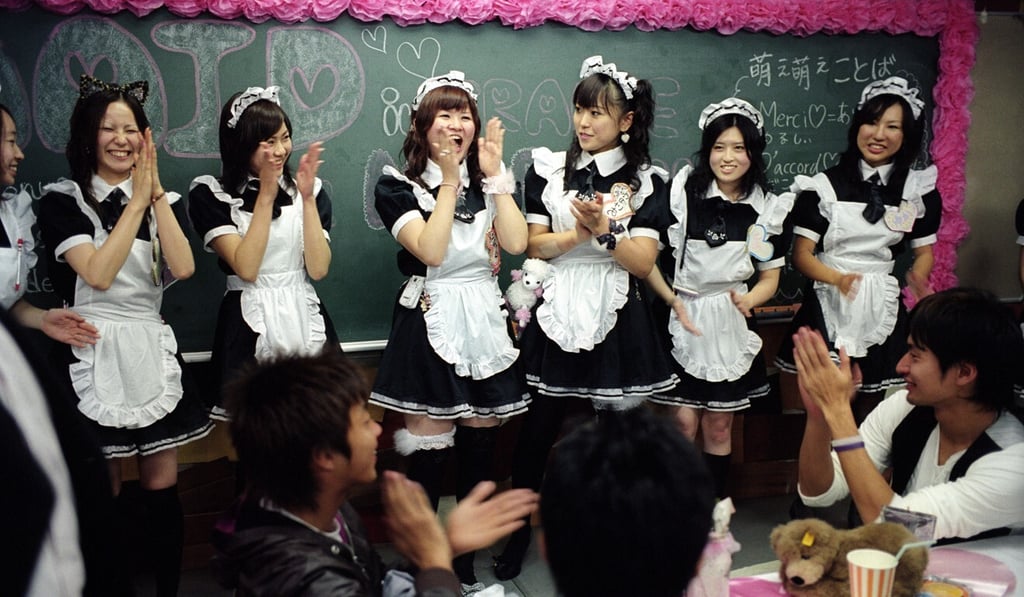 Staff at a maid cafe in Akihabara, an entertainment precinct in Tokyo. Photo: Handout Staff at a maid cafe in Akihabara, an entertainment precinct in Tokyo. Photo: Handout