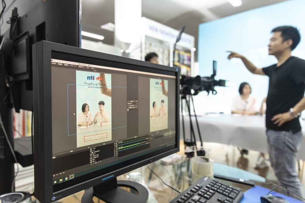 Employees are shown on a screen as a crew prepares a rehearsal for a live-streaming session for the Canton Fair inside a showroom at Ningbo MH Industry Co in Ningbo, a city in eastern China’s Zhejiang province, on June 10. Photo: Bloomberg Employees are shown on a screen as a crew prepares a rehearsal for a live-streaming session for the Canton Fair inside a showroom at Ningbo MH Industry Co in Ningbo, a city in eastern China’s Zhejiang province, on June 10. Photo: Bloomberg