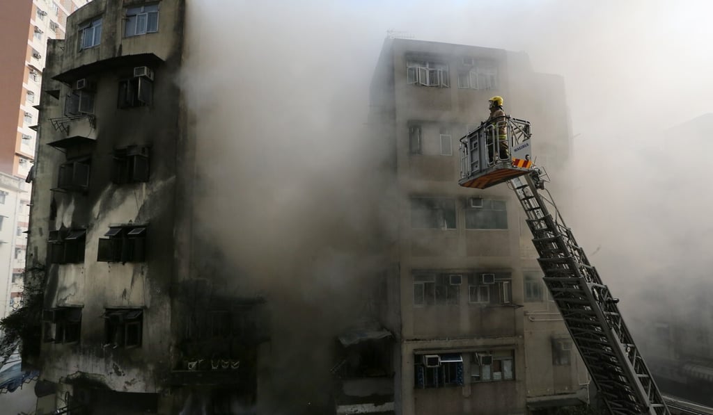 Firefighters battle the blaze in the aftermath of the garage explosion in April 2015. Photo: SCMP Firefighters battle the blaze in the aftermath of the garage explosion in April 2015. Photo: SCMP