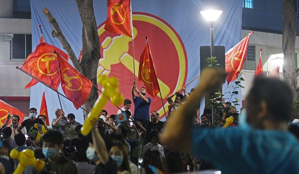 Supporters of Singapore's Workers' Party celebrate its haul of 10 seats in this year’s election. Photo: Xinhua Supporters of Singapore's Workers' Party celebrate its haul of 10 seats in this year’s election. Photo: Xinhua