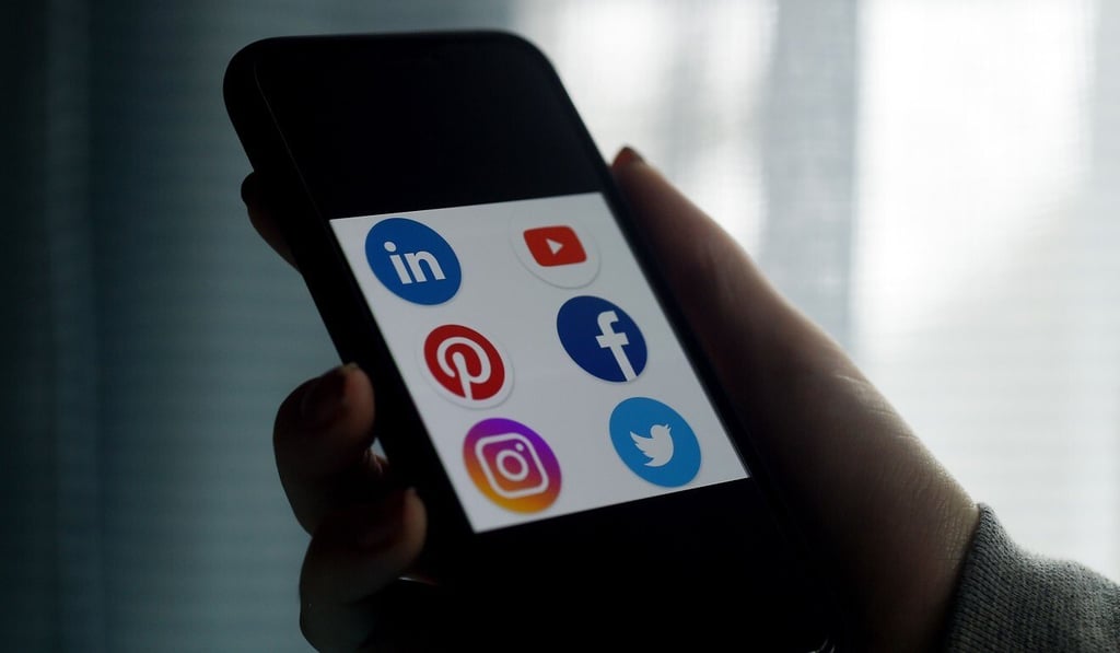 Logos for social media applications LinkedIn, YouTube, Pinterest, Facebook, Instagram and Twitter are displayed on a smartphone. Photo: AFP Logos for social media applications LinkedIn, YouTube, Pinterest, Facebook, Instagram and Twitter are displayed on a smartphone. Photo: AFP