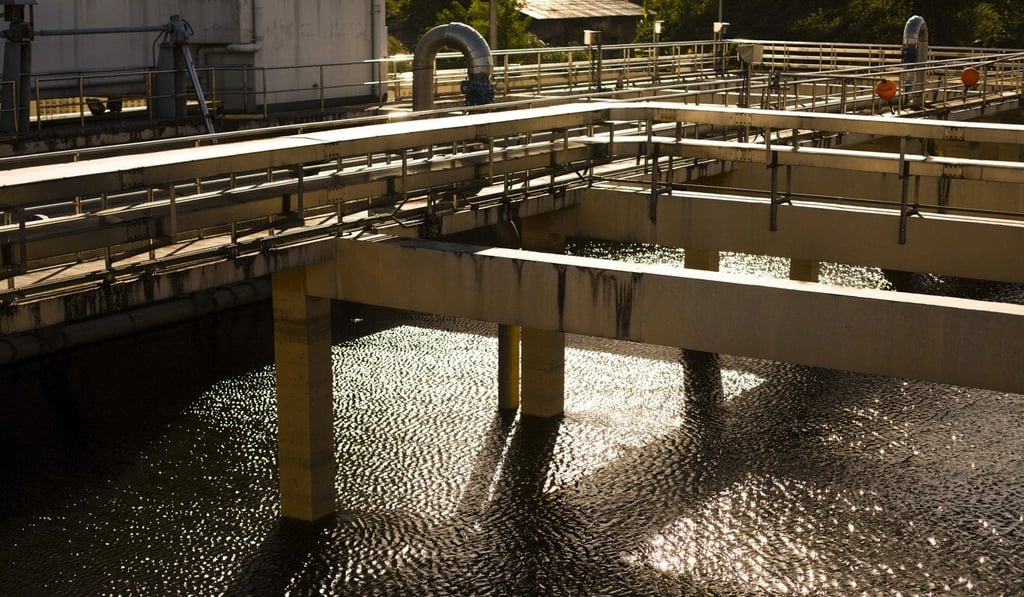 Waste water flows into tanks at a sewage treatment plant. Photo: Bloomberg