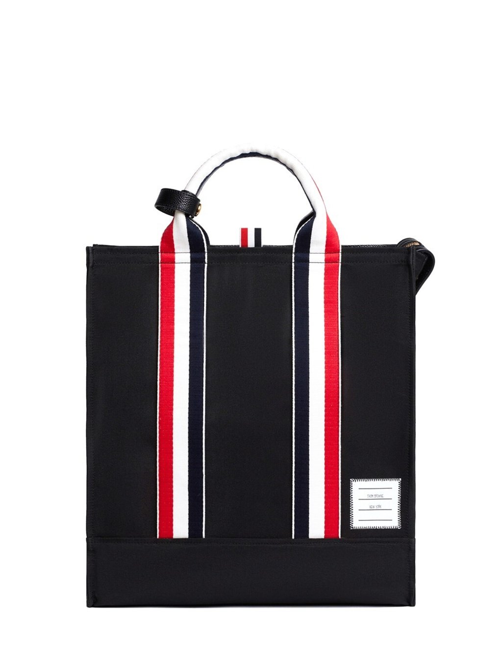 Thom Browne’s grosgrain stripe tote bag. Photo: Thom Browne