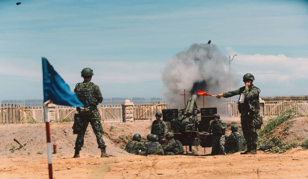 Soldiers operate a 155mm howitzer during a drill in Taichung ahead of this week’s war games. Photo: AFP