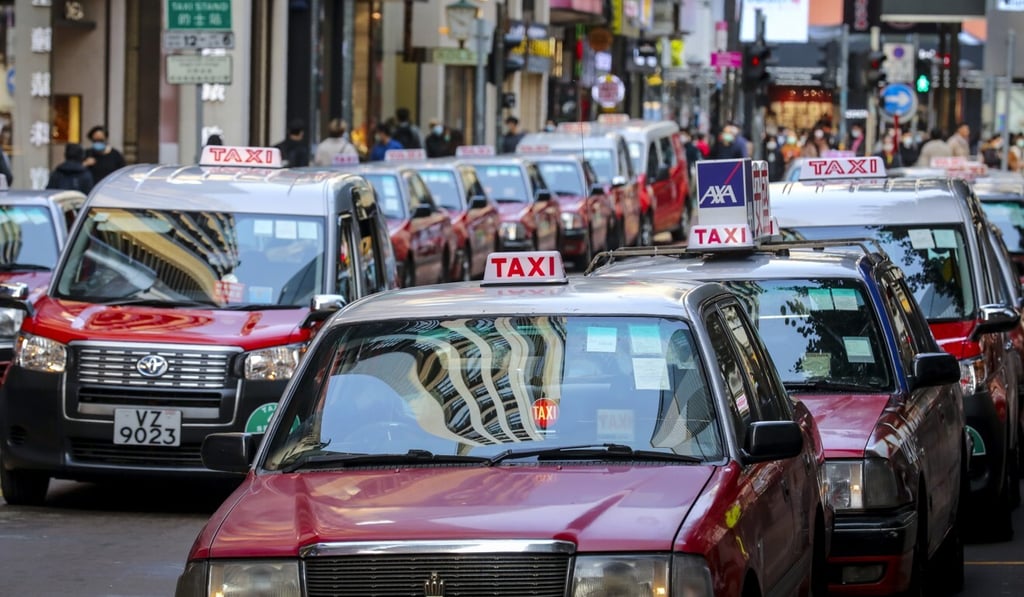 Cabbies are advised to give friendly reminders to passengers without masks. Photo: Winson Wong