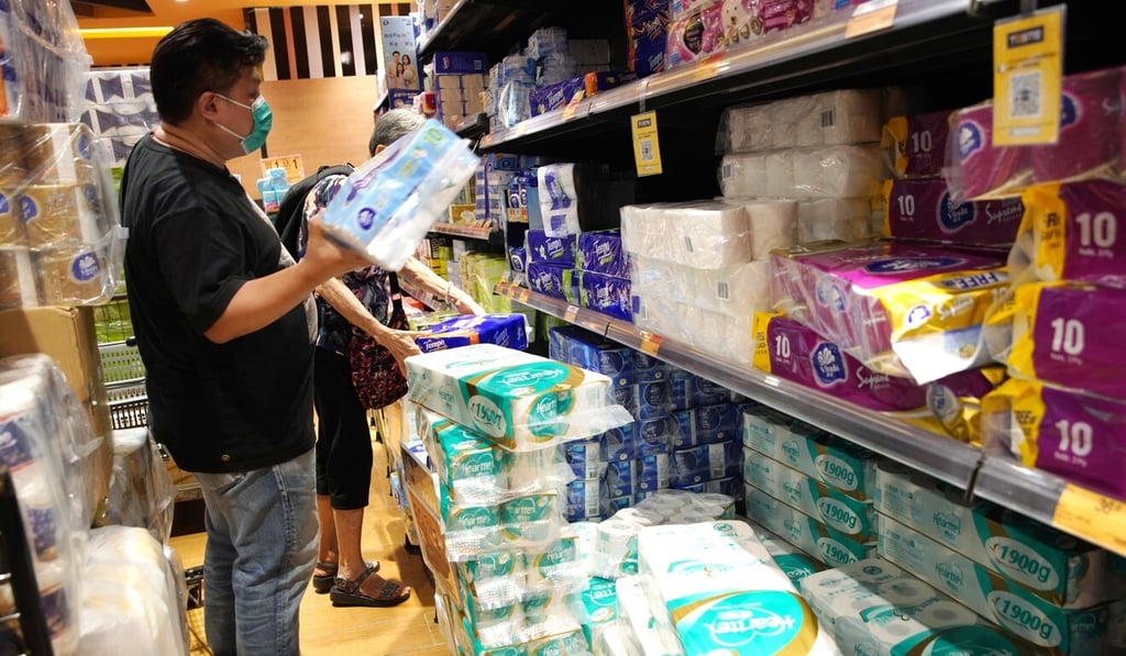 A man buys toilet tissue at a supermarket in Diamond Hill amid the third wave of coronavirus infections on Tuesday. Photo: Winson Wong A man buys toilet tissue at a supermarket in Diamond Hill amid the third wave of coronavirus infections on Tuesday. Photo: Winson Wong