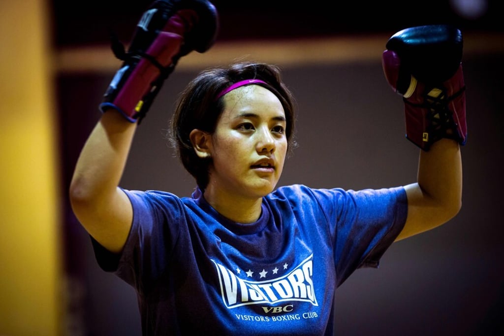 Japanese boxer and nurse Arisa Tsubata trains at a gym in her hospital. Photo: Behrouz Mehri/AFP Japanese boxer and nurse Arisa Tsubata trains at a gym in her hospital. Photo: Behrouz Mehri/AFP