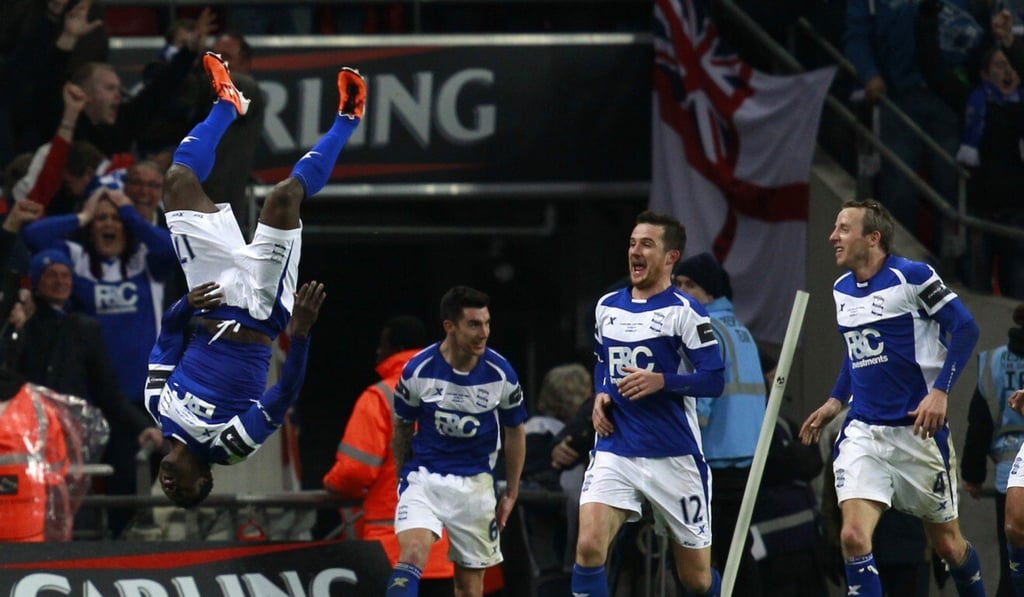 Birmingham City's Obafemi Martins (left) celebrates his goal against Arsenal during the 2011 English League Cup final. Photo: Reuters Birmingham City's Obafemi Martins (left) celebrates his goal against Arsenal during the 2011 English League Cup final. Photo: Reuters