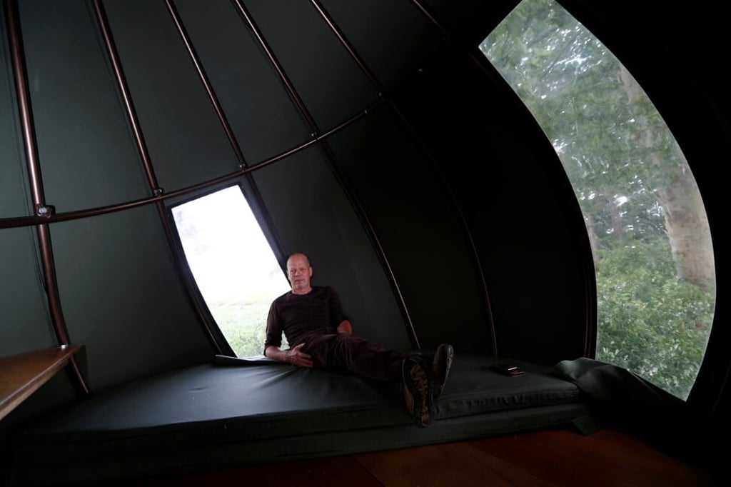 Wapenaar poses inside a tent. Photo: Reuters
