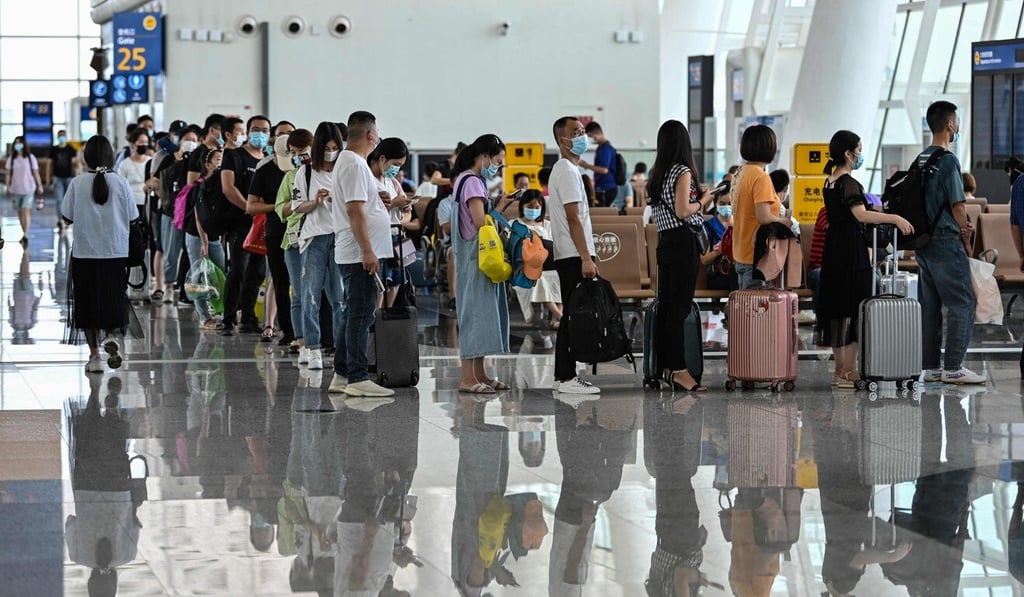 Passengers wait to board their flights in Wuhan. China’s population is expected to fall dramatically by 2100. Photo: AFP