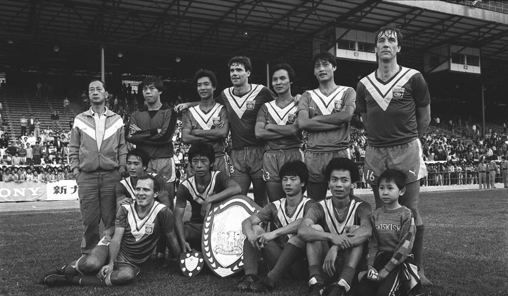 The Seiko football team with the Senior Shield after beating Happy Valley 1-0 in the final at Hong Kong Stadium. Chan Fat-chi is sitting next to the trophy (third from the right). Photo: SCMP Picture