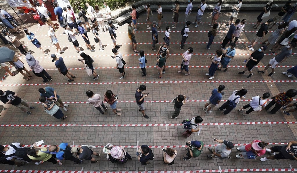 More than 600,000 Hong Kong residents queued up to vote in an opposition camp primary held over the weekend. Photo: Felix Wong